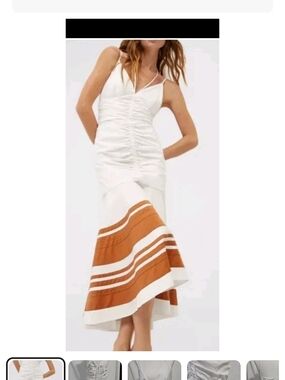 Veronica Beard White Dress with Rust Striped Hem.